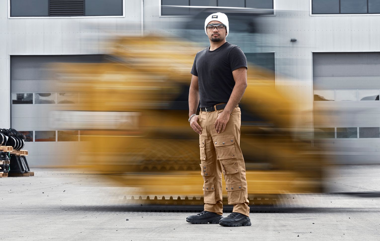 Standing in front of fast-moving CAT machinery.